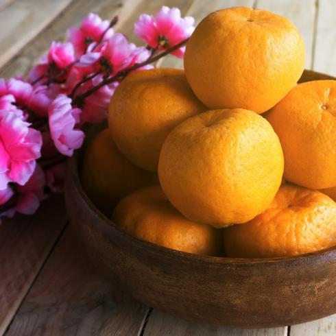 A bowl of citrus fruit as part of lunar new year decorations