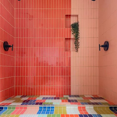 Colourful tiles in walk-in shower