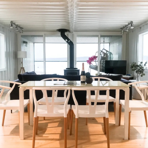 Dining room in shipping container Airbnb