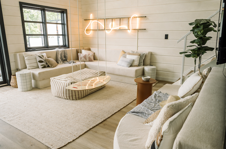 Reusing and old ladder to make a DIY cottage light on Renovation Resort