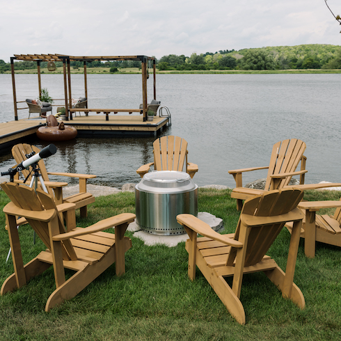 Outdoor fire pit area by dock