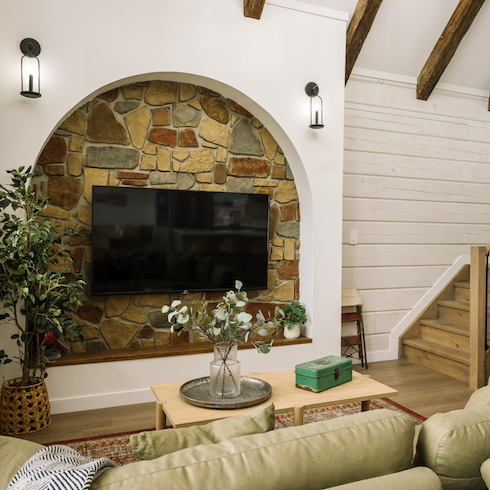 Stone fireplace with custom arch