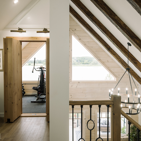 Loft gym in an A-frame structure