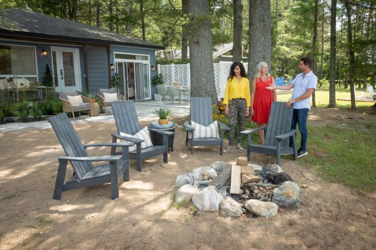 Amanda, Emily, and Scott enjoy the new outdoor living space of the breezy beach house