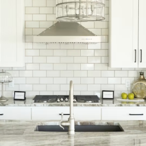 Kitchen with white subway tile