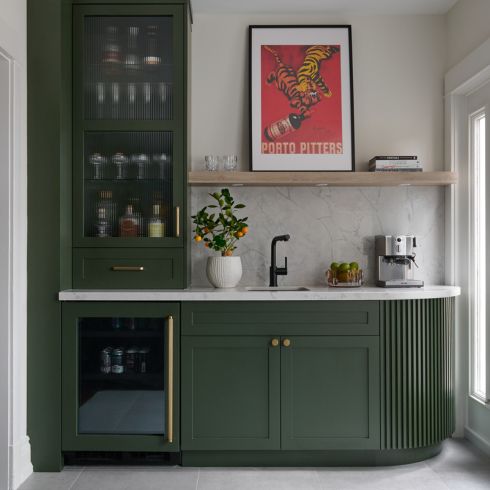 Green wet bar in kitchen