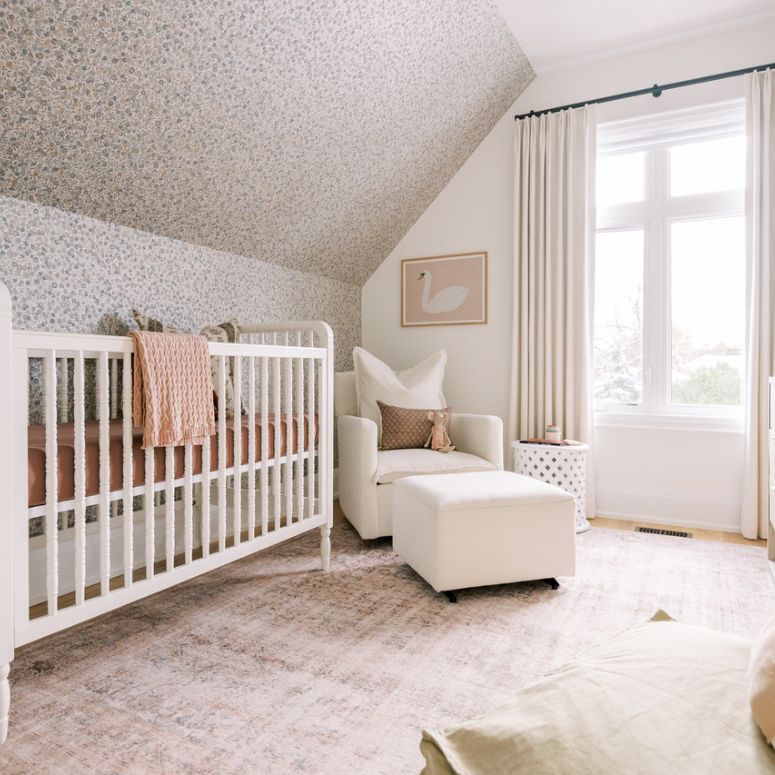 Nursery room with wallpaper on ceiling