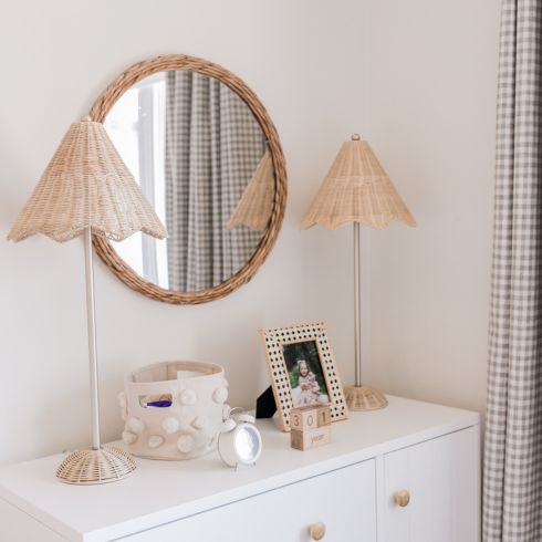 Two rattan table lamps in nursery