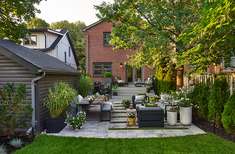 Backyard terrace with different lounging areas