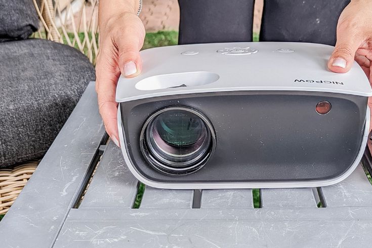 projector being set up outside for outdoor movie night