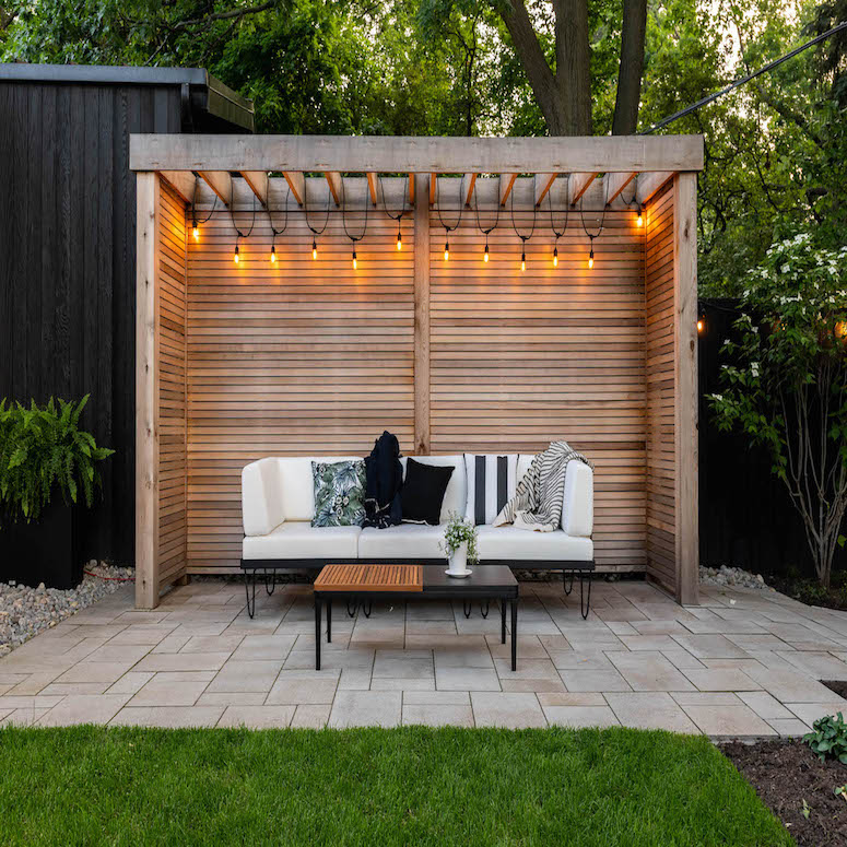 Gazebo with outdoor sofa in backyard