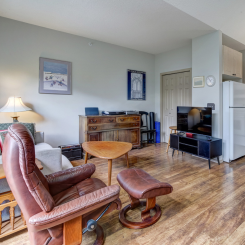 Canmore apartment with vaulted ceiling and mountain views.