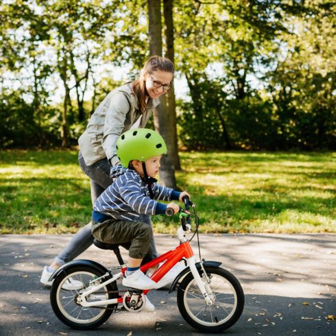 Mom with kid riding bike