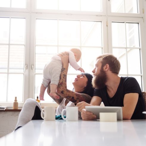 Parents with baby in the kitchen