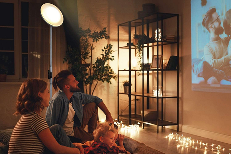 LED floor lamp in living room with family 