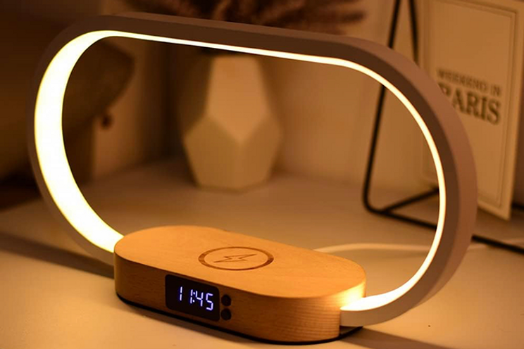 Circular bedside table lamp with a wireless charger