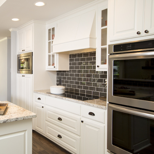 Black brick backsplash in kitchen