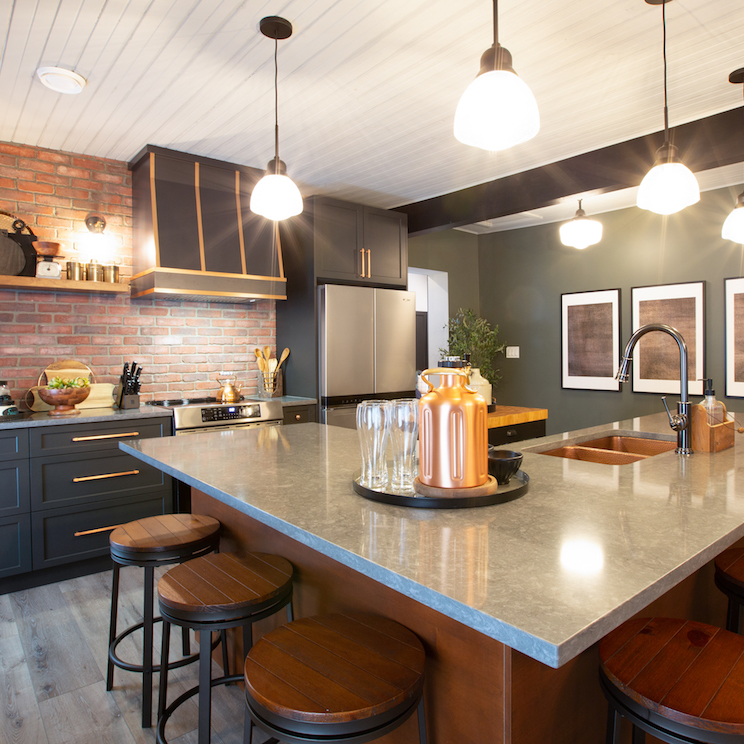 Kitchen with exposed brick wall