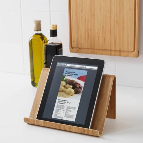 Wooden IKEA tablet stand holding iPad in kitchen