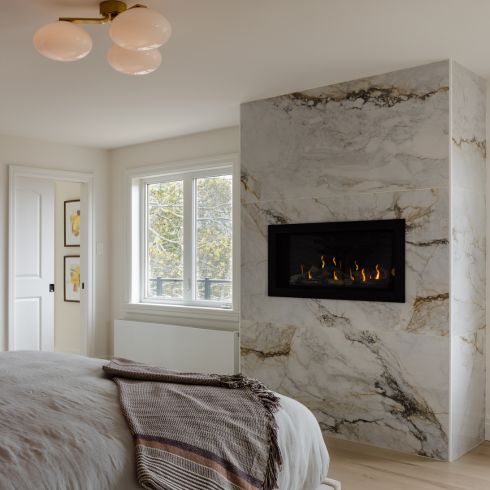 Bedroom with fireplace