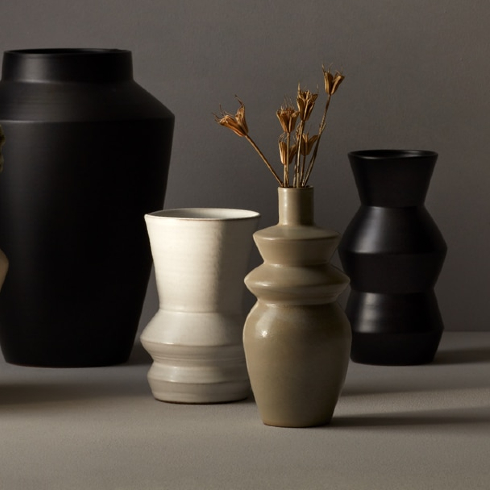 A trip of classic teracotta vases