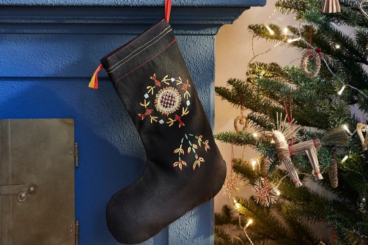 Black stocking on blue mantle