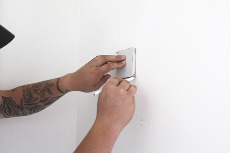 Cutting drywall to size when patching a hole in the wall