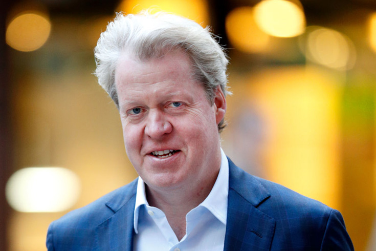 Princess Diana's brother Earl Charles Spencer smiling for the cameras