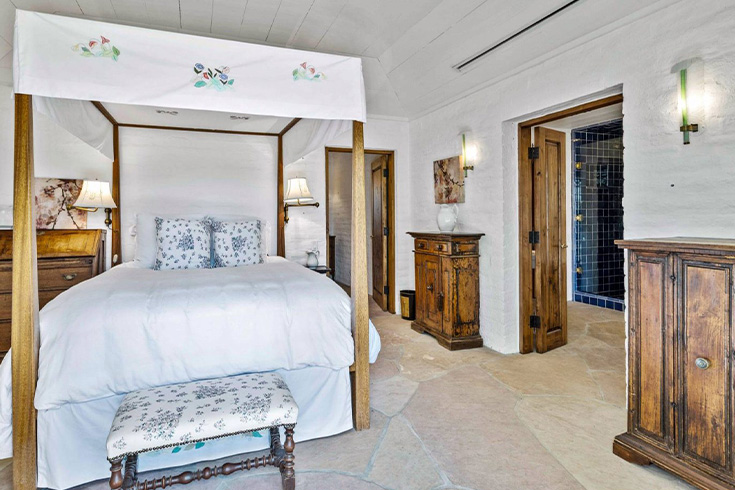 White walls, white bed primary bedroom