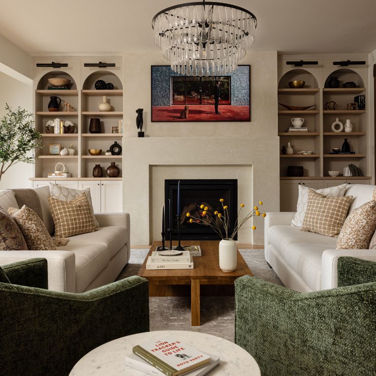 Living room with archways and bookcases