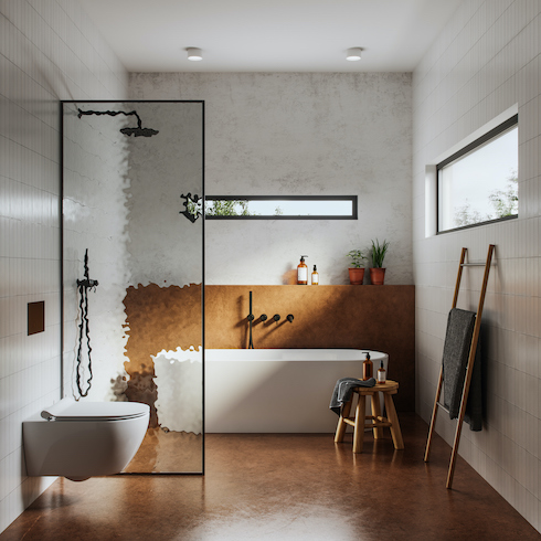 Modern bathroom interior with plaster walls, brown high shine floors, floating toilet, stand alone white bathtub in a shower wet room with black hardware shown in the Home Network gallery Unusual Bathroom Renovation Ideas That Will Be Popular In 2025