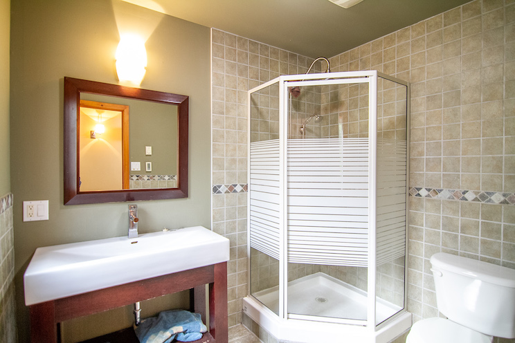 Outdated shower in an Ontario cottage