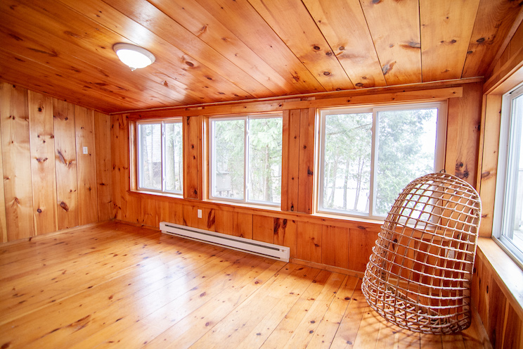 Outdated sunroom in an Ontario cottage