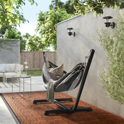 The Bockoen Hamnoen hammock from IKEA set up in an outdoor space