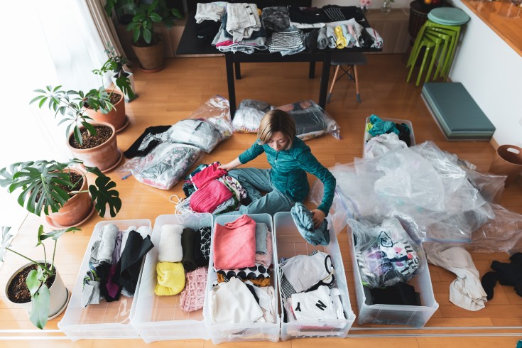 person sorting clothing