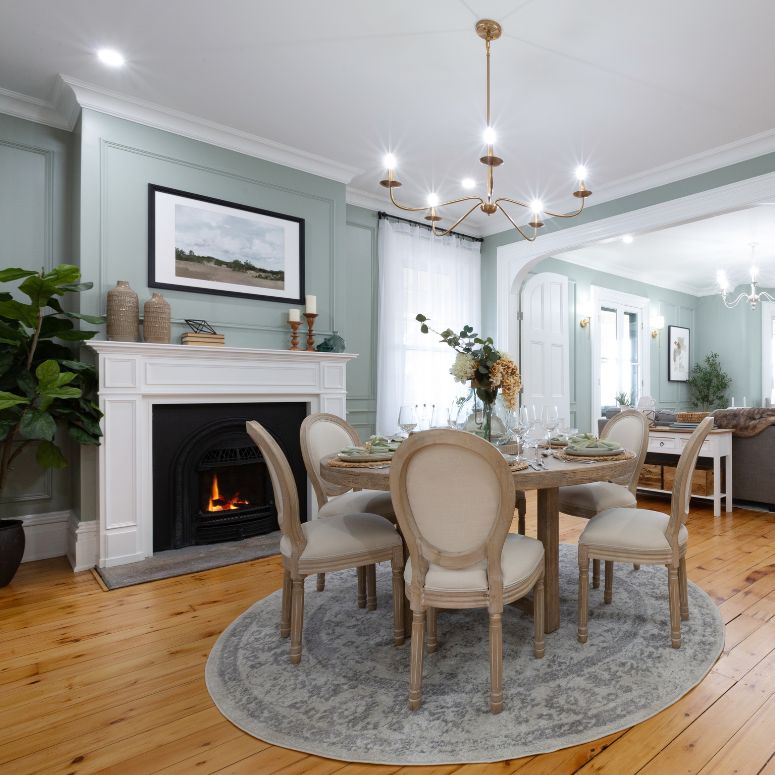 Bright dining room next to fire place