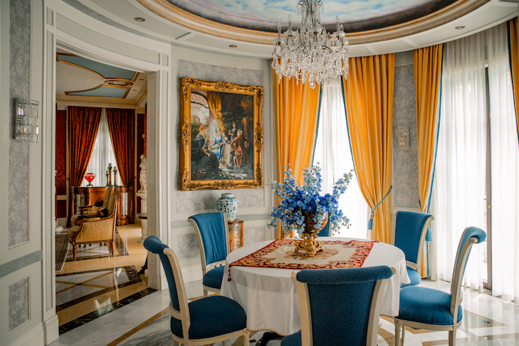 A formar dining room and chandelier
