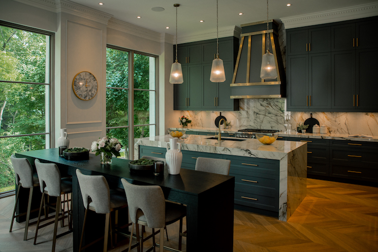 Upscale kitchen with custom range and green cabinets