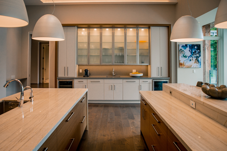 A garage with counterspace and cupboards