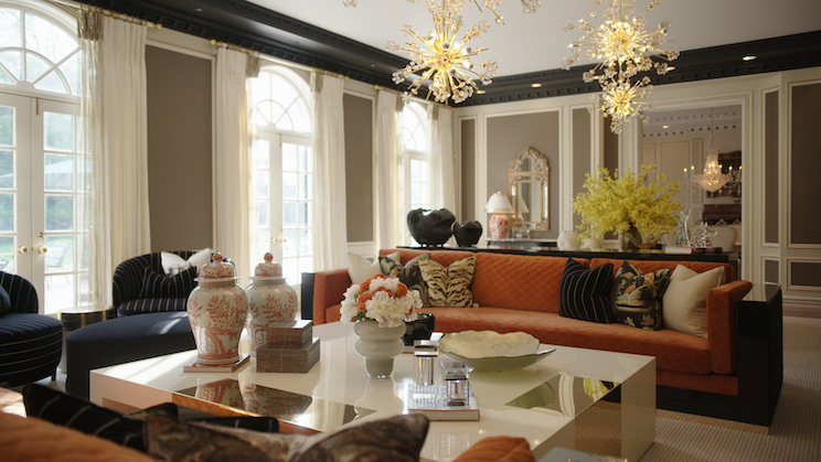 Living room with lavish details and chandelier