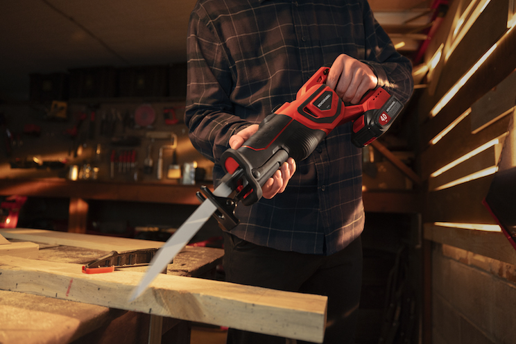 Man using reciprocating saw
