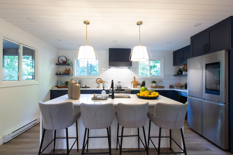 Large blue and white kitchen with island seating