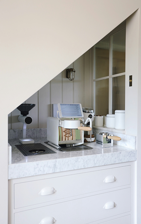 A modern coffee station in a small kitchen