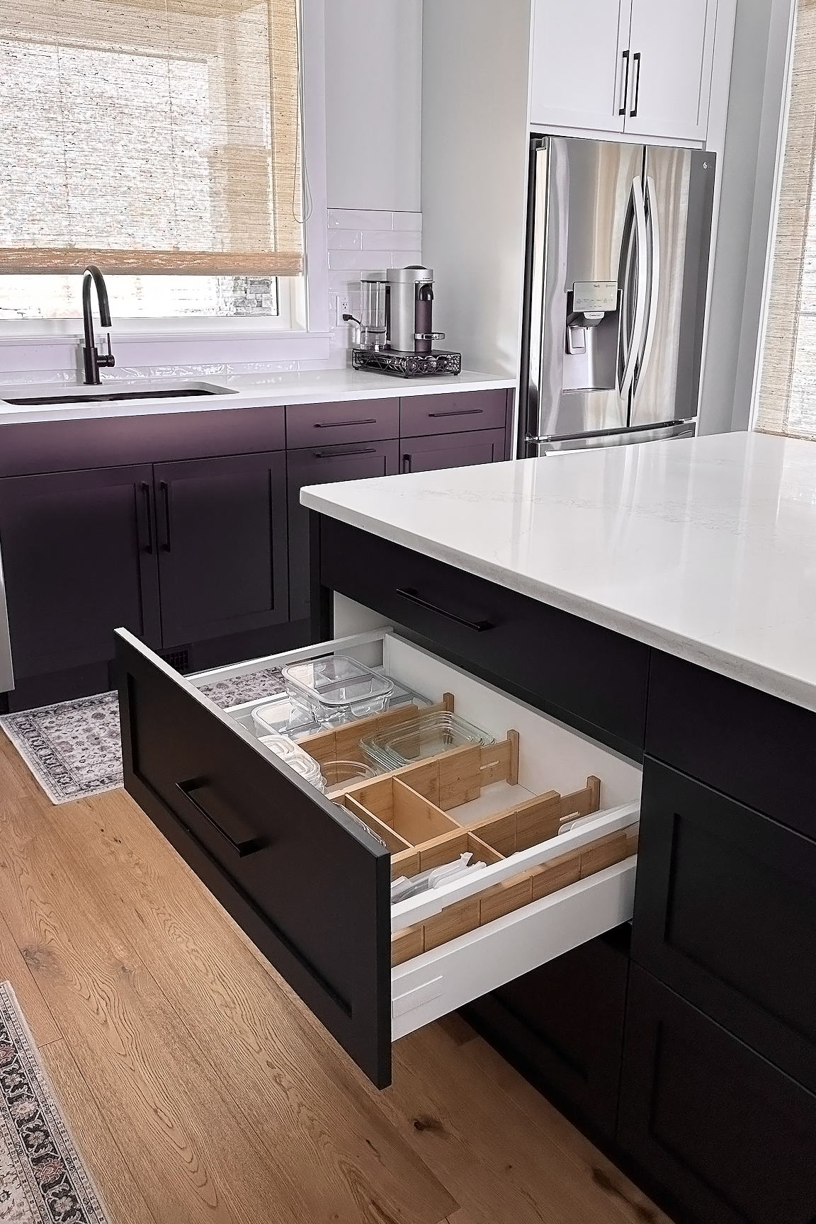 An open drawer in a clean kitchen
