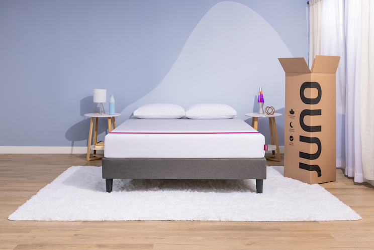 Mattress in a blue grey room