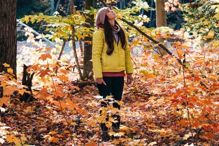 Woman taking a hike in the fall