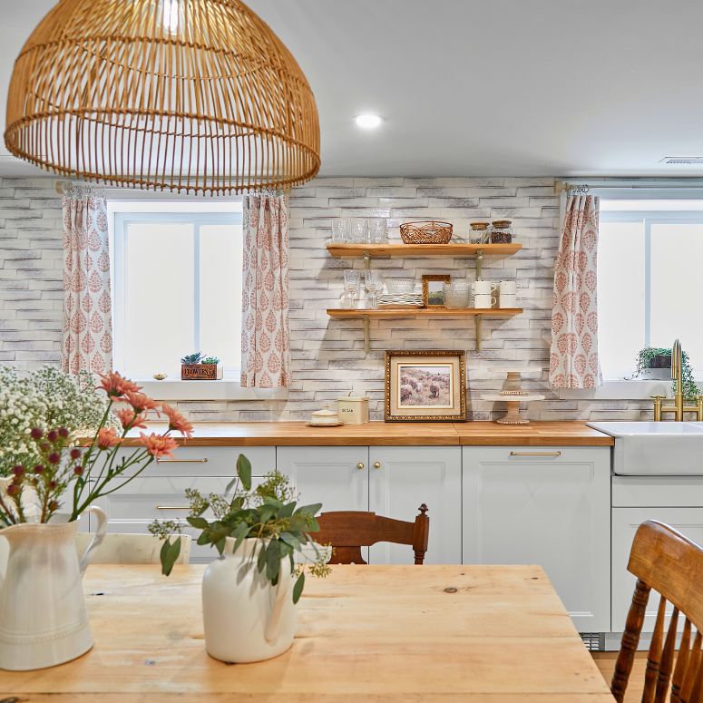 Bright kitchen with light wood accents and overhead light