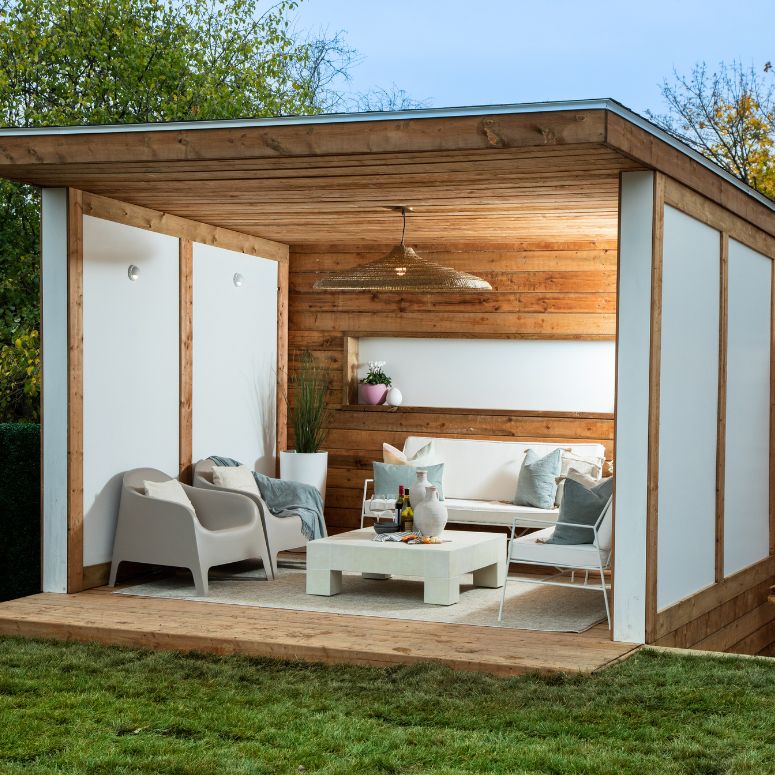 Bright open cabana space with white furniture