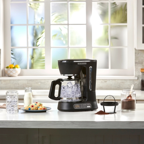 Black & Decker SplitBrew Programmable Coffee Maker with Glass Carafe filled with ice cubes sits on a white counter in a bright kitchen as part of HGTV's Gift Ideas for the Men in Your Life post