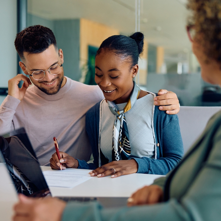 Young couple getting mortgage